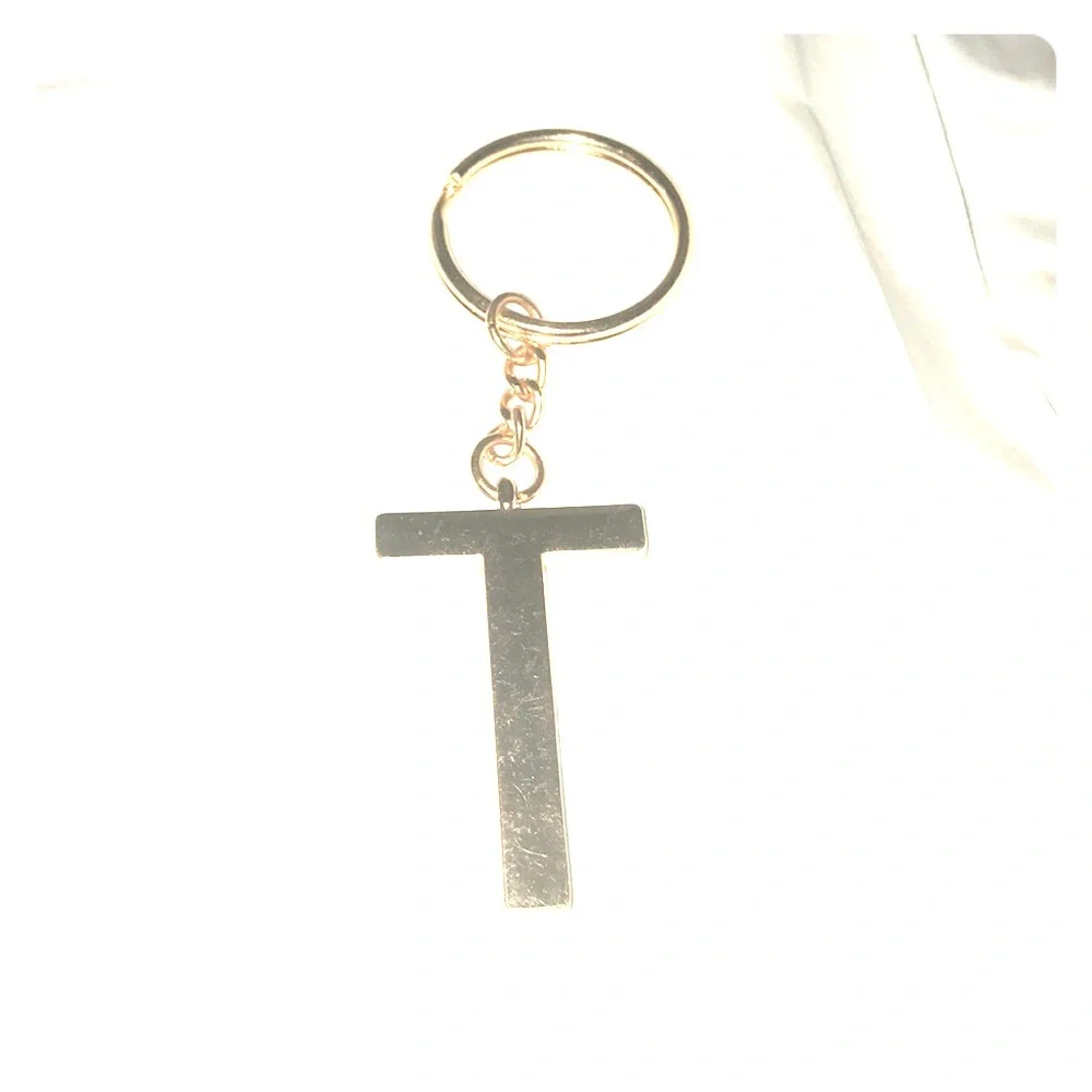 Letter T monogram key chain in rose gold new